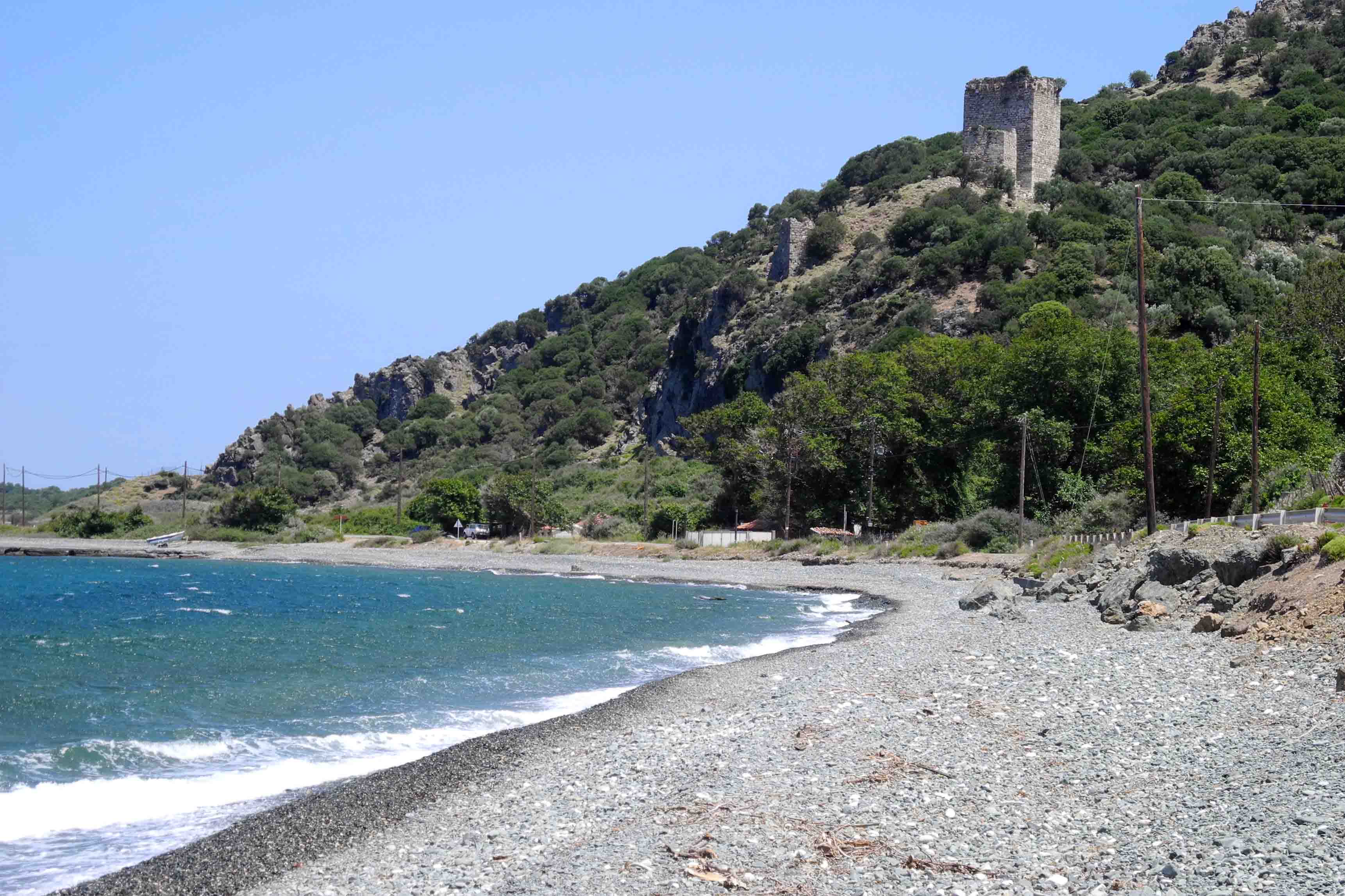 The pebble beach outside our living quarters with a view of the ancient city walls.