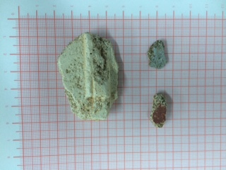Red, white, and blue are plasters that I see. Each fragment special and priceless to me.