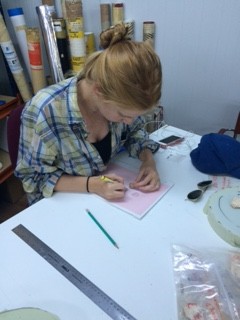 Here Madeleine sketches a plaster piece. She gets more tired as fragments increase.