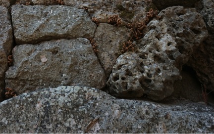 Stones in the Faux-Mycenaean Niche, including Vuggy Crystalline Limestone and Porphyritic Quartz Trachyte. Photograph by J. Mundy