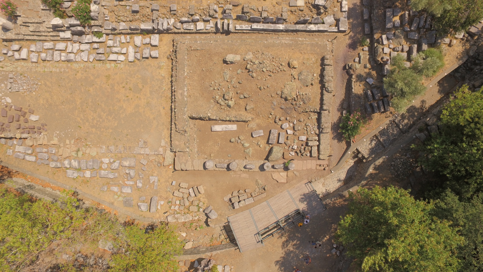 Why Did the Initiate Cross the Ravine? Understanding the Altar Court and Theater